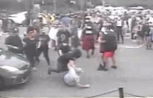 Video Shows Five Protesters Attacking, Kicking Man that Brandished Gun